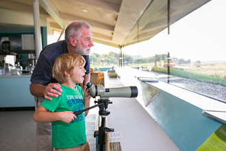 Boy and grandad at Cley visitor centre