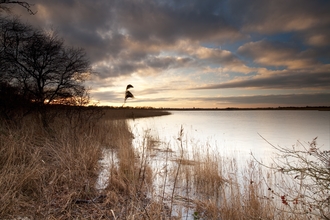 Sunset reeds and water at Martham Broad and Marshes