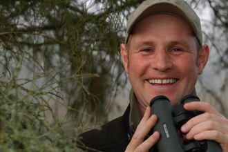 Mike Dilger with binoculars