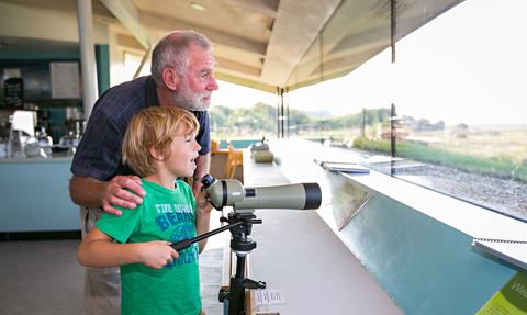 Boy and grandad at Cley visitor centre