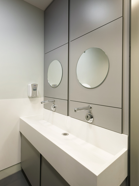 Sink and mirrors in the bathroom at Cley