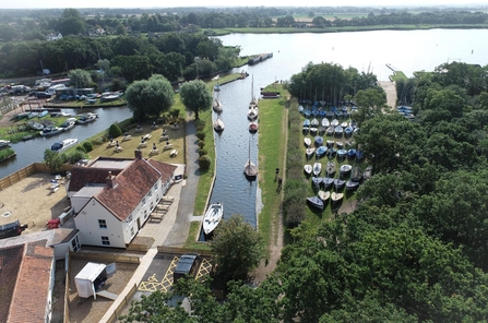 Aerial view of the Pleasure Boat Inn with views of Hickling Staithe and the wider broad