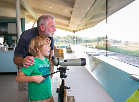 Boy and grandad at Cley visitor centre