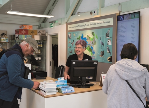 Staff and customers as the tills at Hickling visitor centre