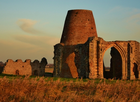 Ruins of St Benet's Abbey as the sun sets and shadows start to fall